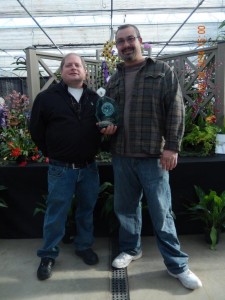 George and Dean accepting the Orchid Digest Award for the COS Show Display